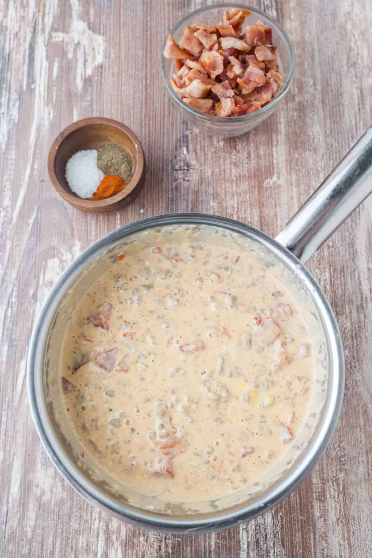 finished bacon cheeseburger dip in a saucepan