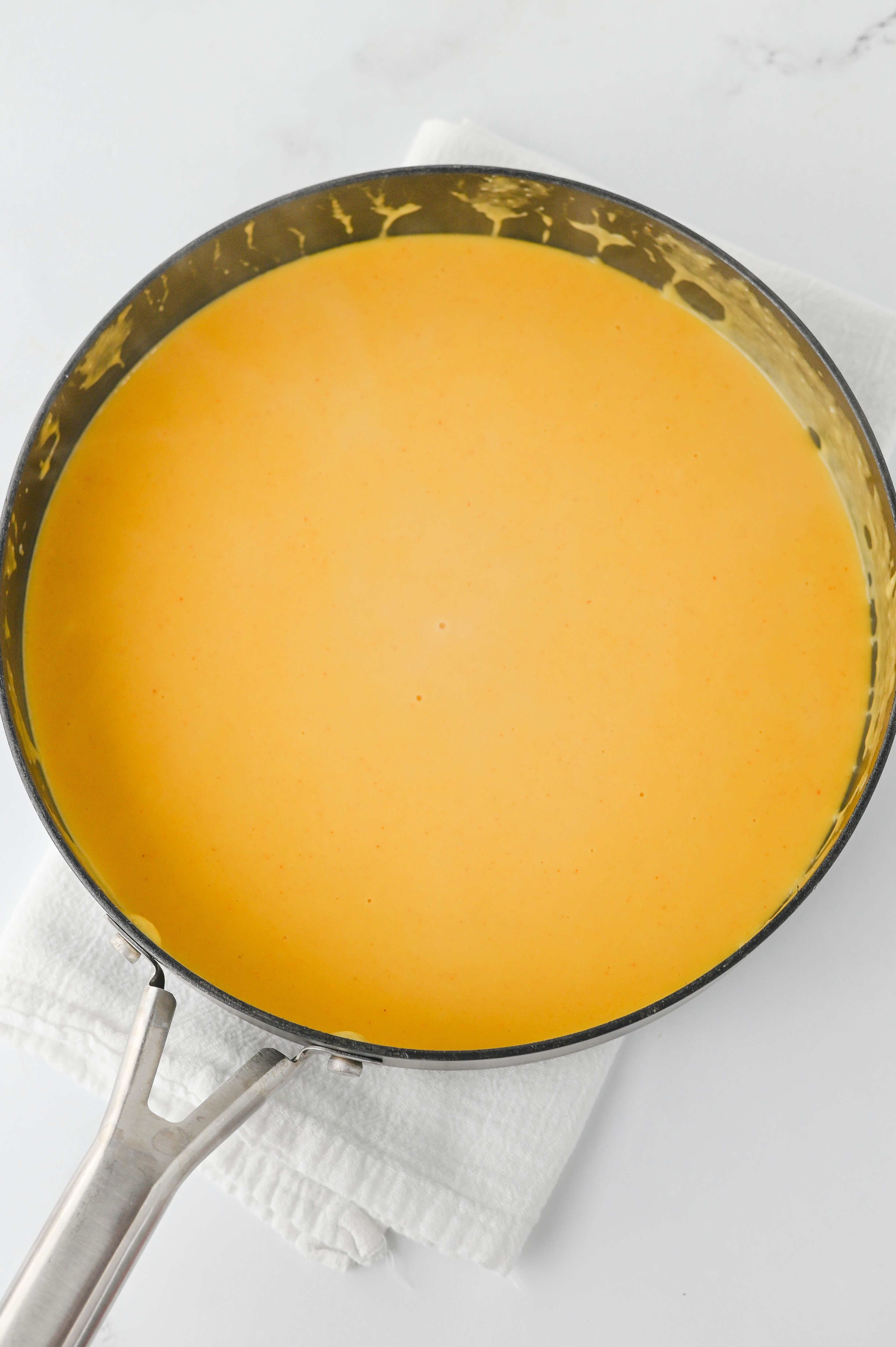 finished beer cheese in a skillet