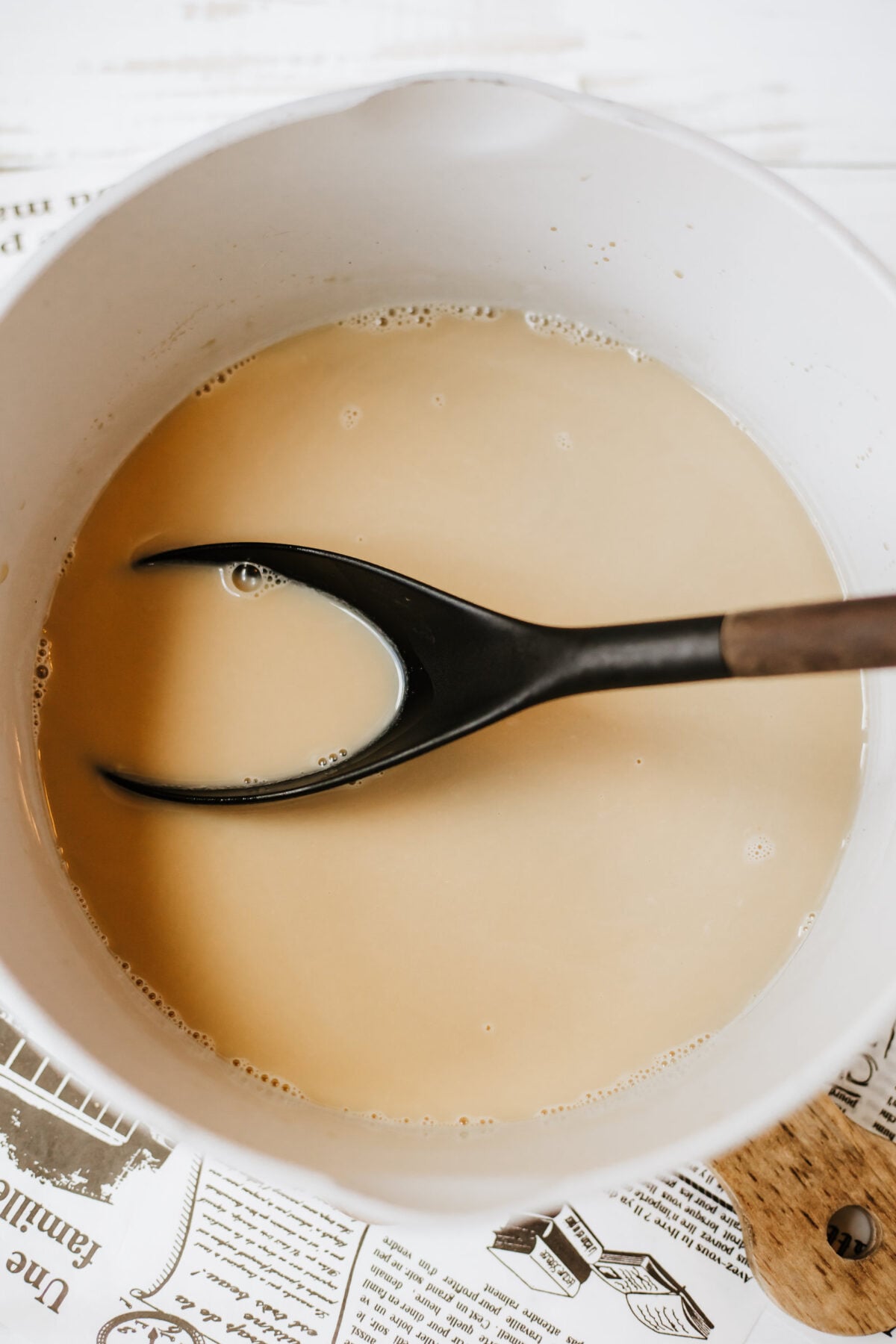 creamer in a pot with a spoon