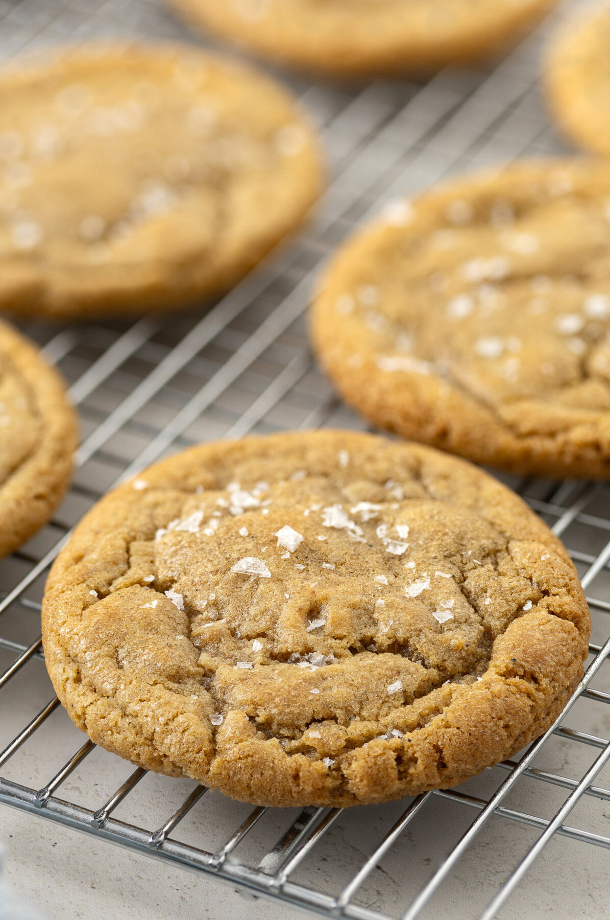brown butter chocolate chipless cookies on a wire rack