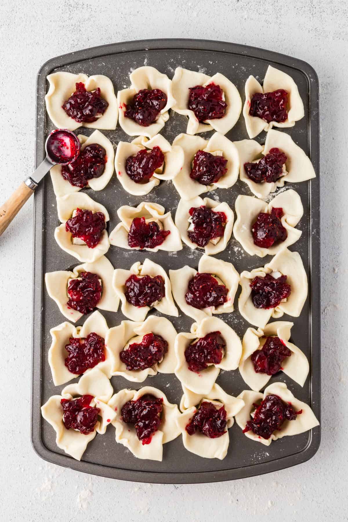 cranberry sauce added to the puff pastry cups