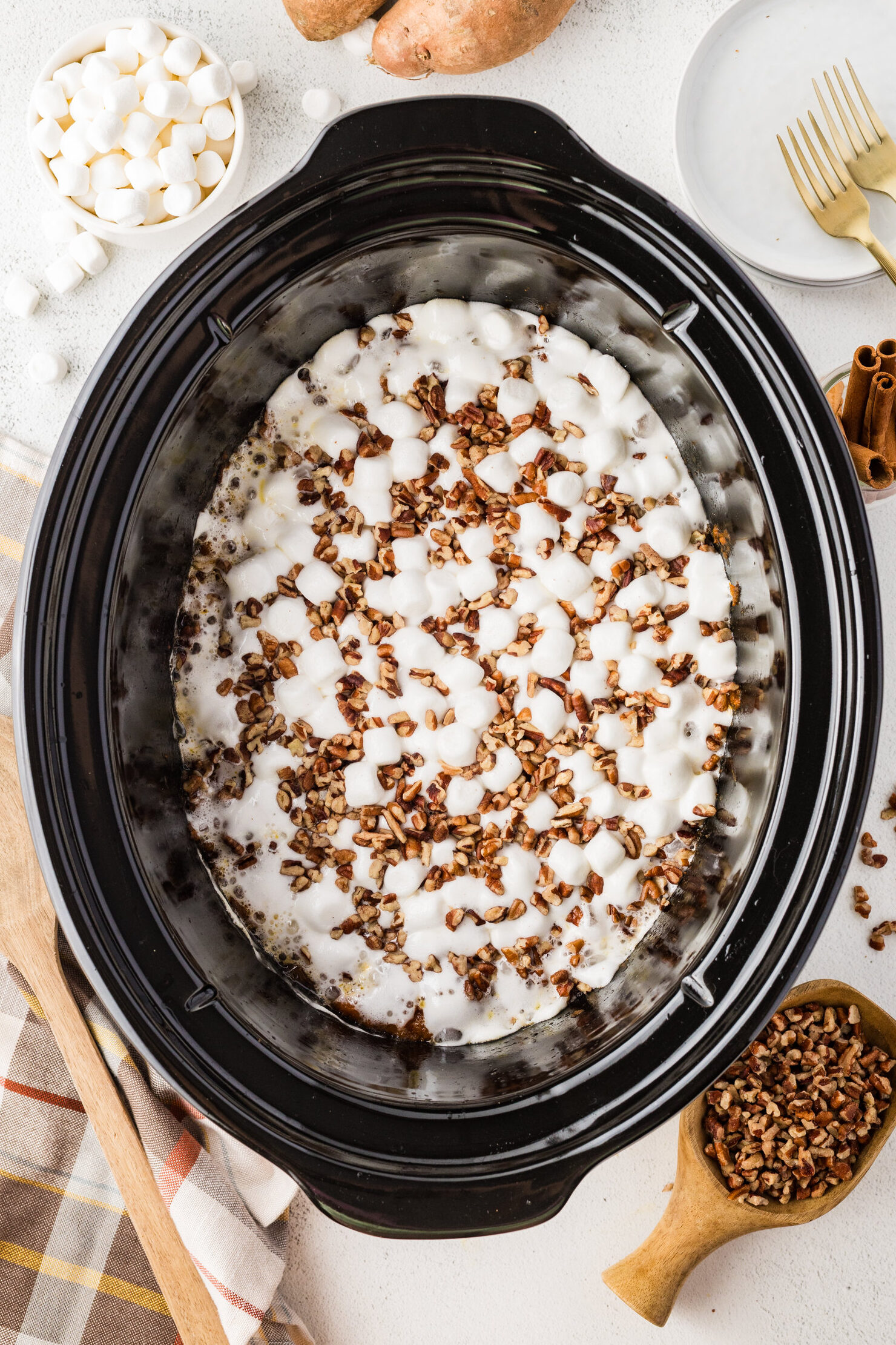 chopped pecans and melted marshmallows over the sweet potatoes in a crockpot