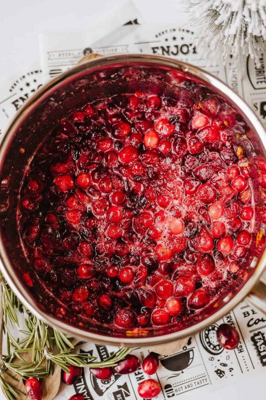 cooking cranberry sauce in a large pot
