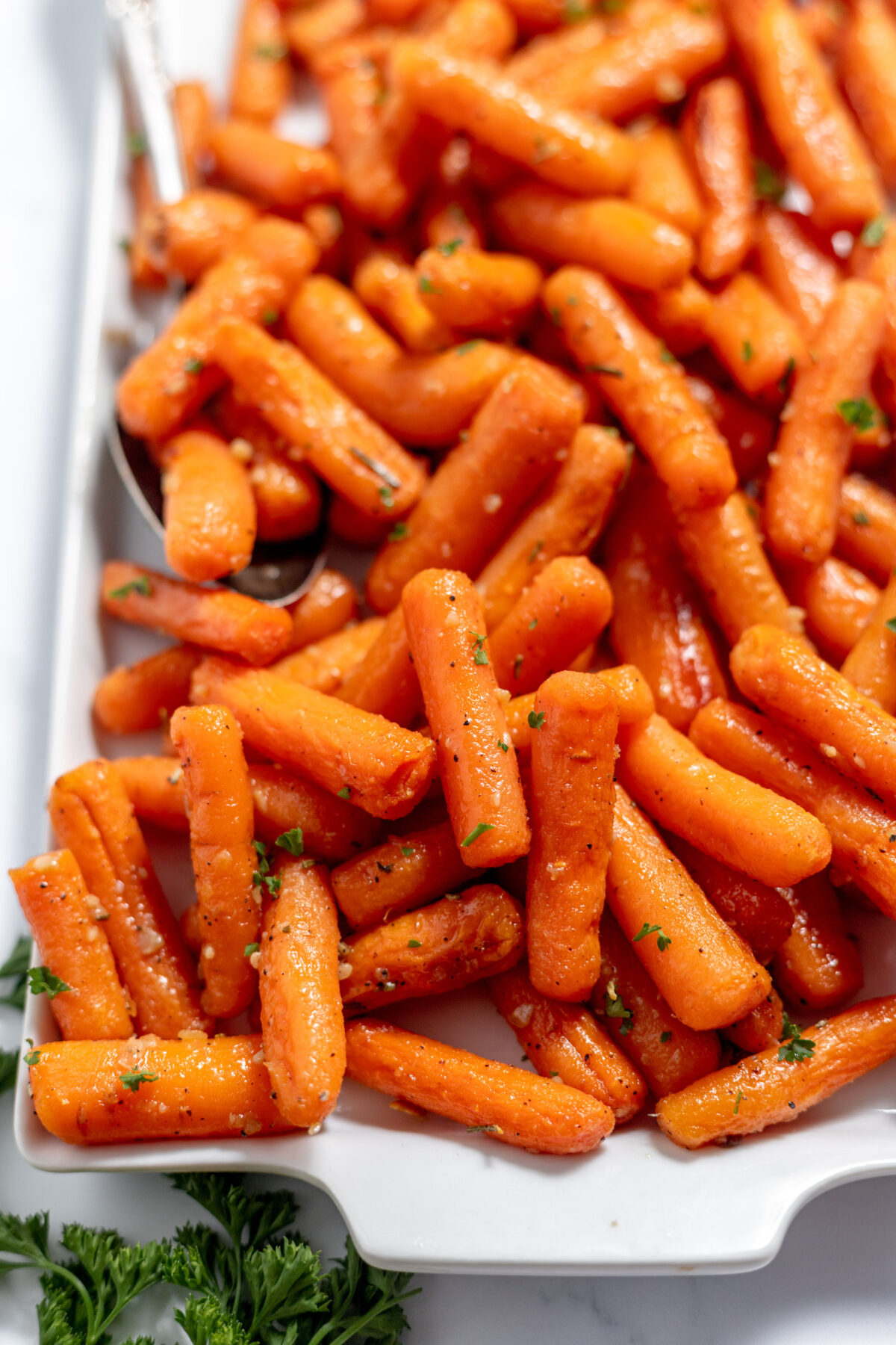 maple glazed carrots on a white dish