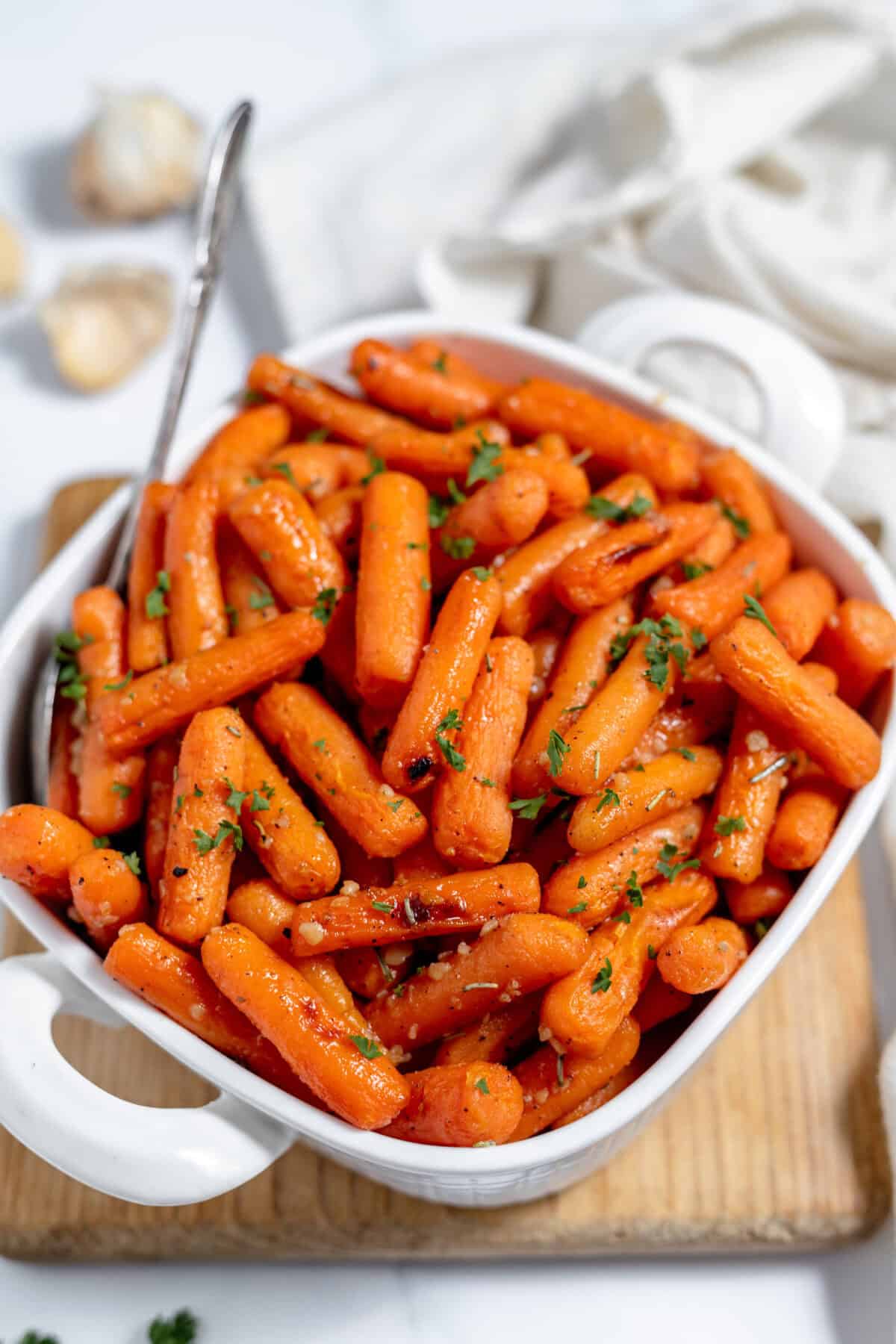 maple glazed carrots on a white dish