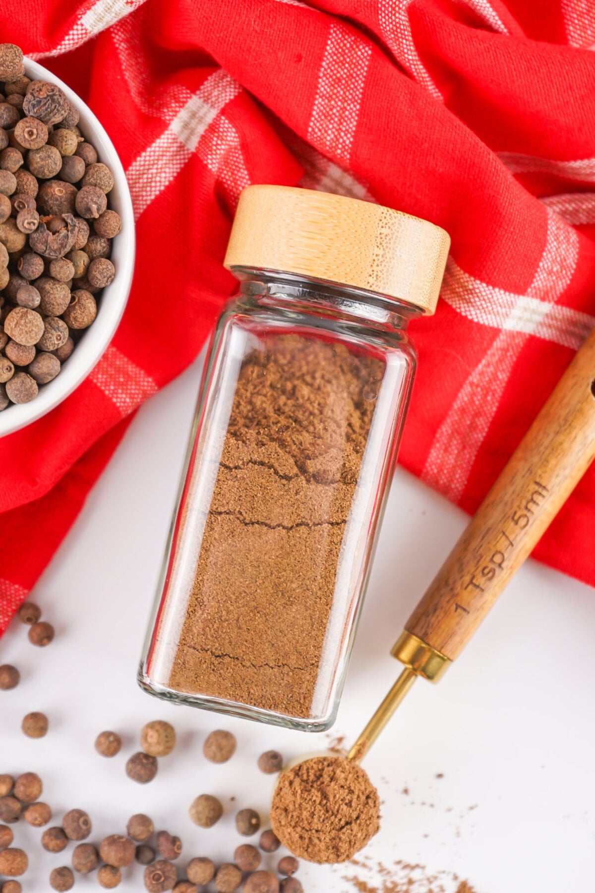 ground allspice in a jar