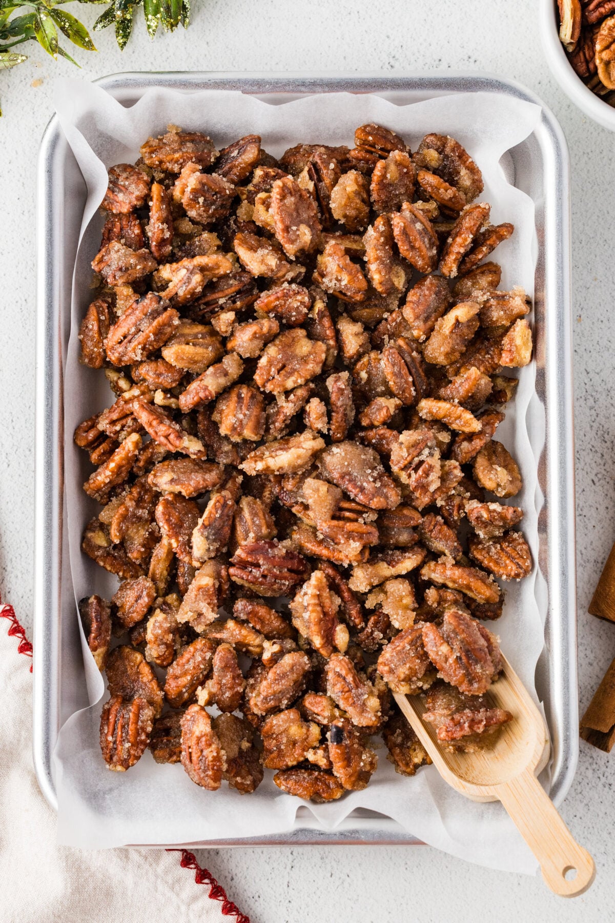 baking sheet of spiced pecans