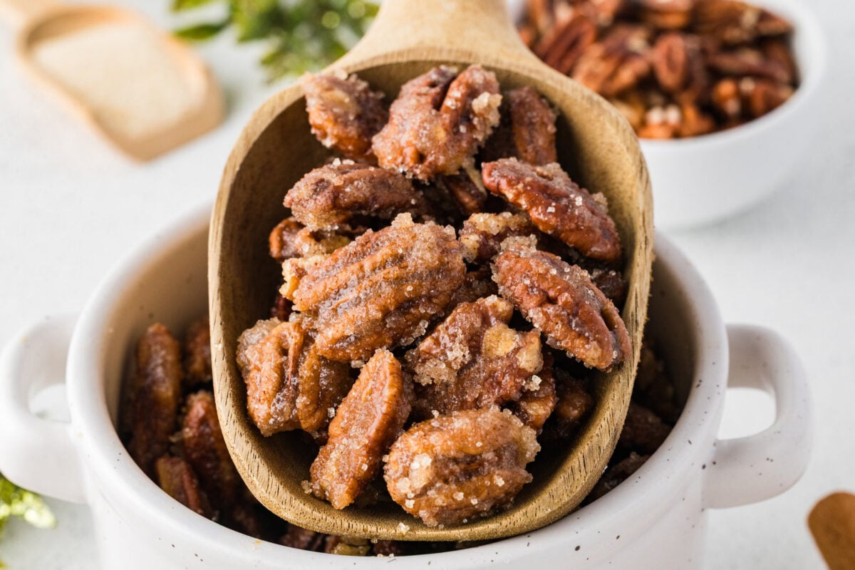 wooden scoop of spiced pecans