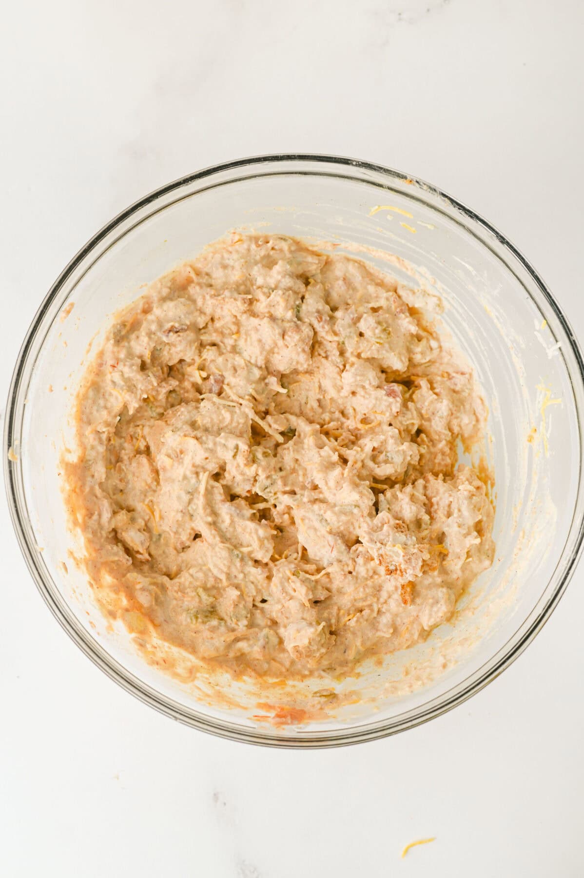 bean dip ingredients mixed up in a bowl