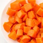 boiled sweet potatoes on a white plate