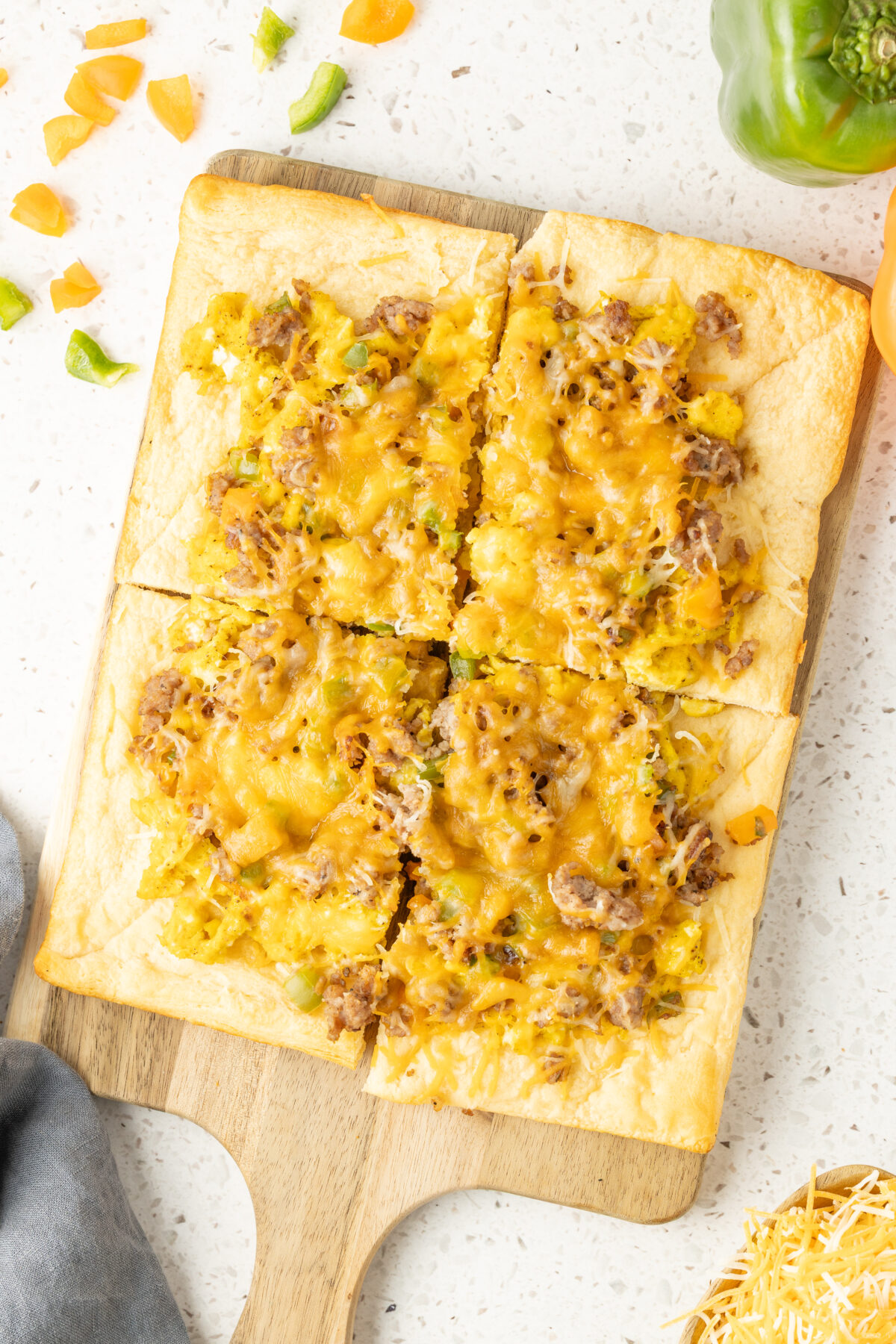 breakfast pizza cut into rectangles