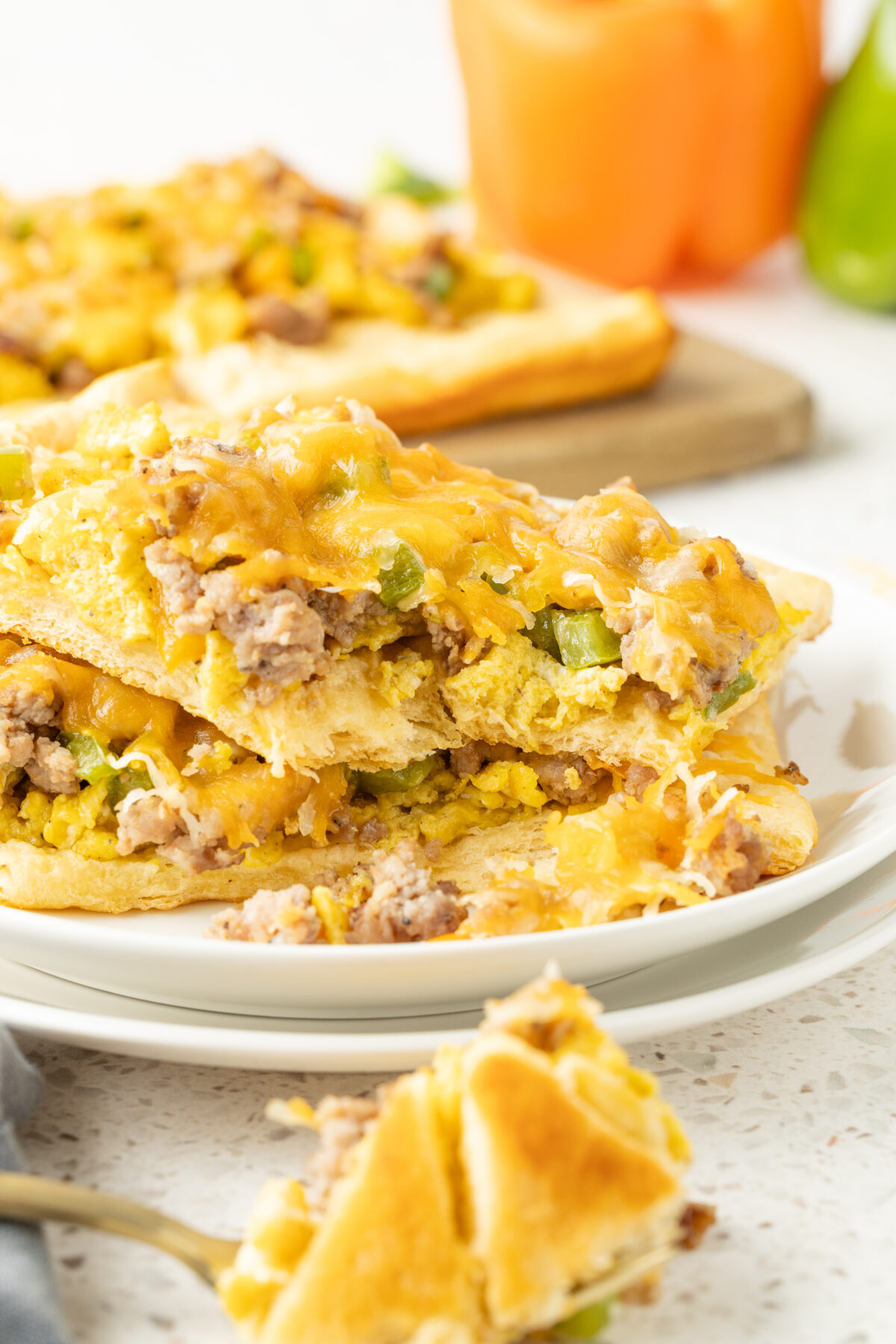 slices of breakfast pizza stacked up