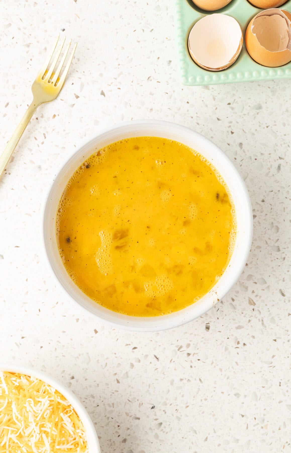 mixed up eggs in a bowl