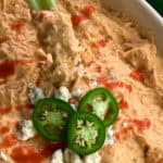 buffalo chicken dip with a celery stick