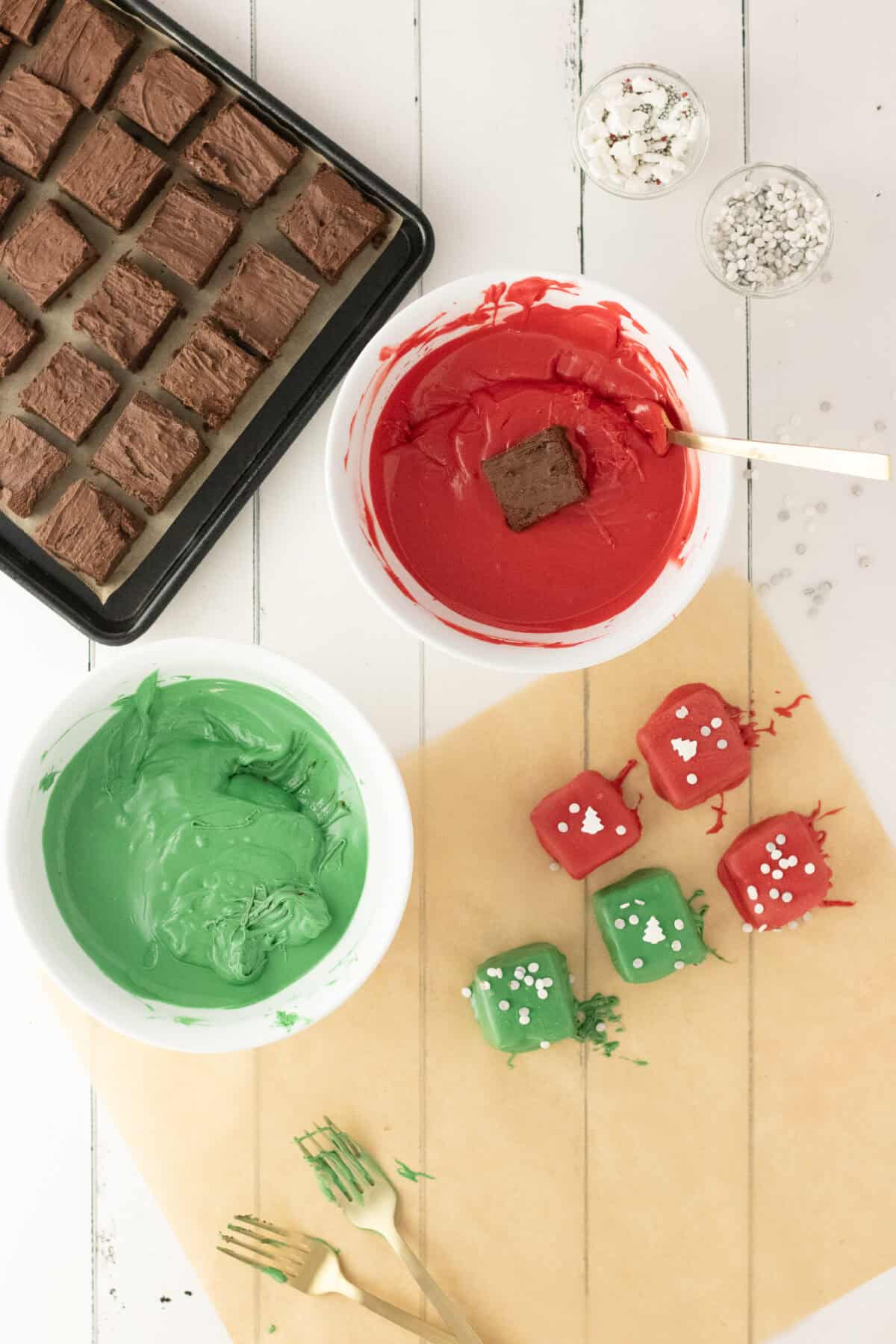 squares being dipped into melted candy melts
