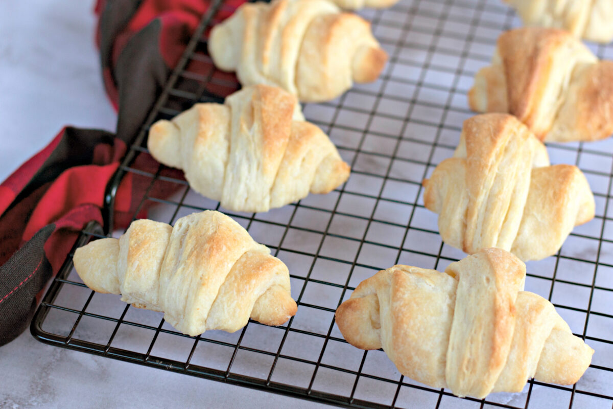 homemade crescent rolls on a wire rack