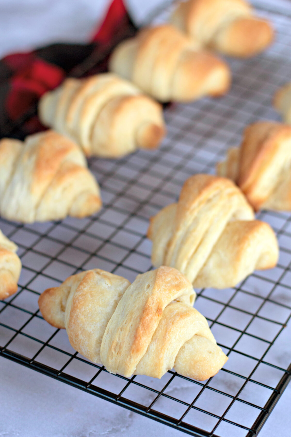 crescent rolls on a wire rack