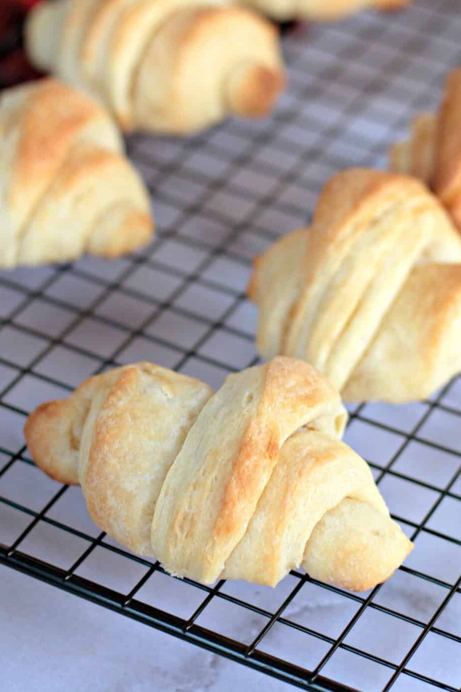 homemade crescent rolls on a wire rack