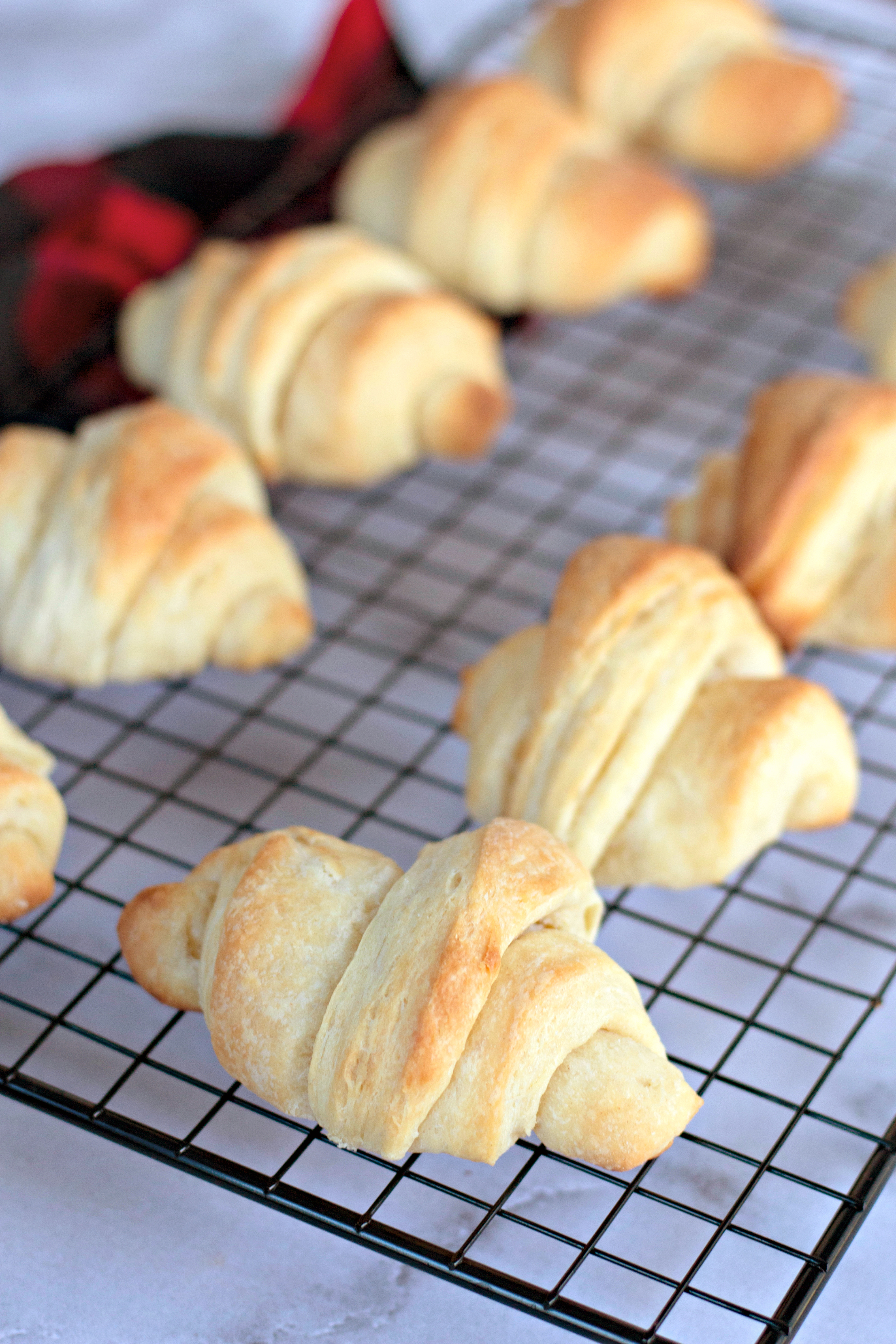 homemade crescent rolls on a wire rack