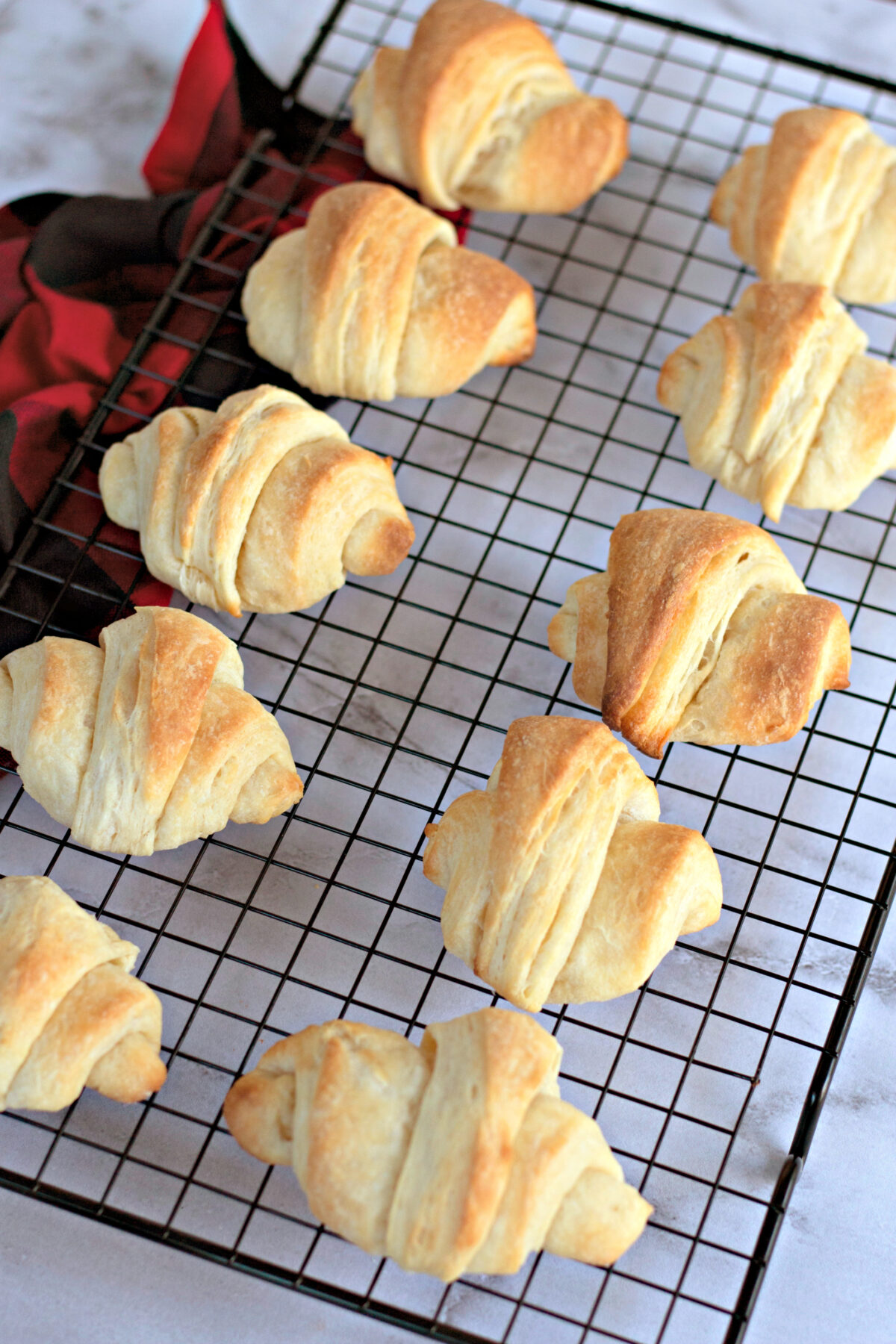 homemade crescent rolls on a wire rack