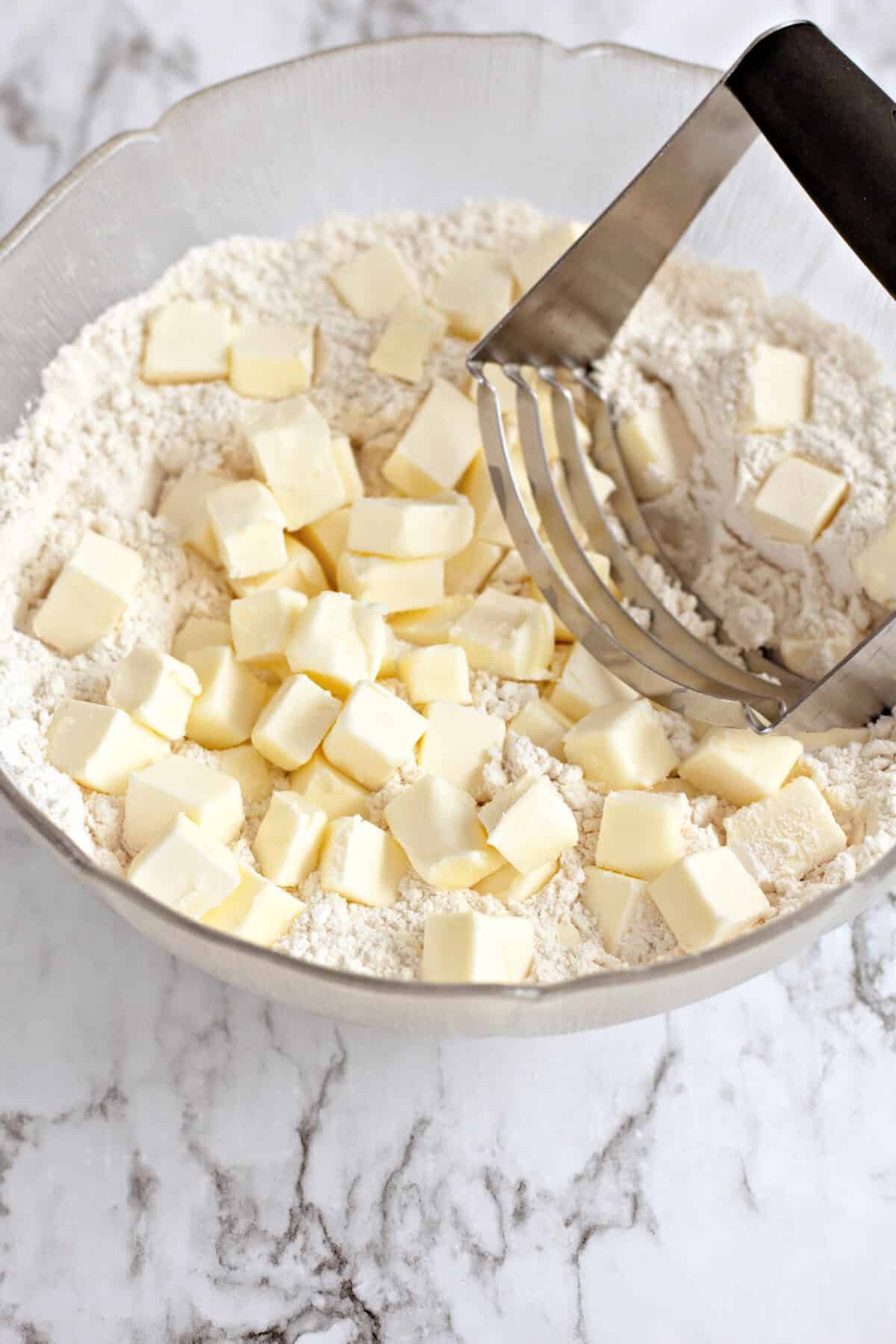 cutting butter into crescent roll dough