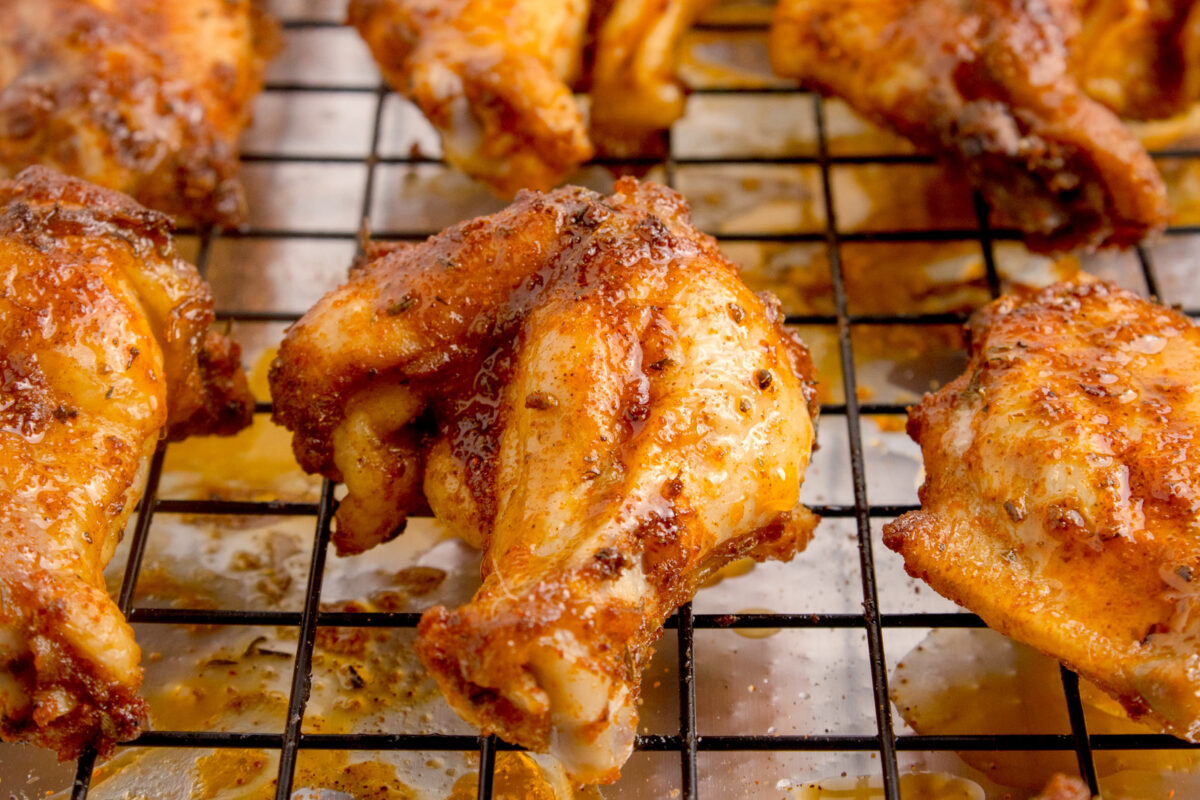 baked dry rub wings on a wire rack