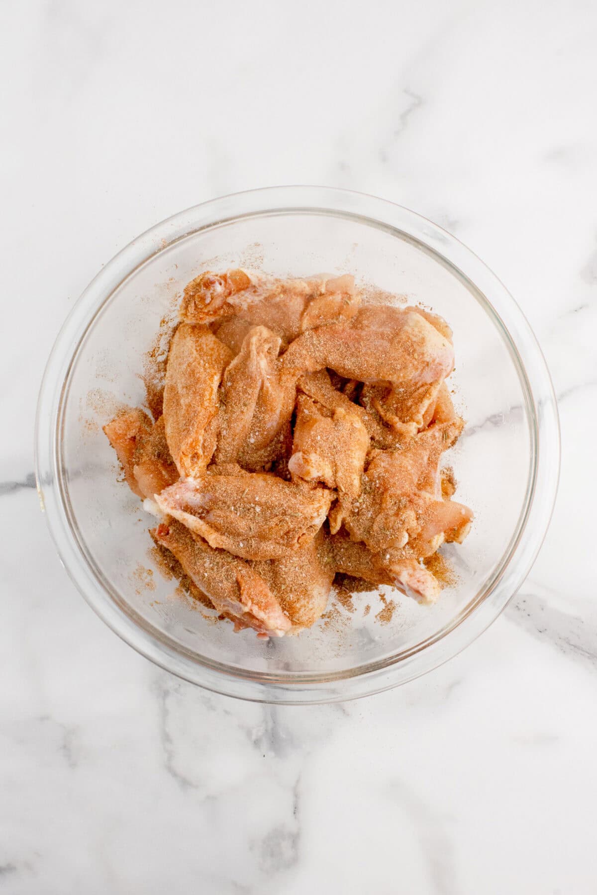 dry rub sprinkled over chicken wings