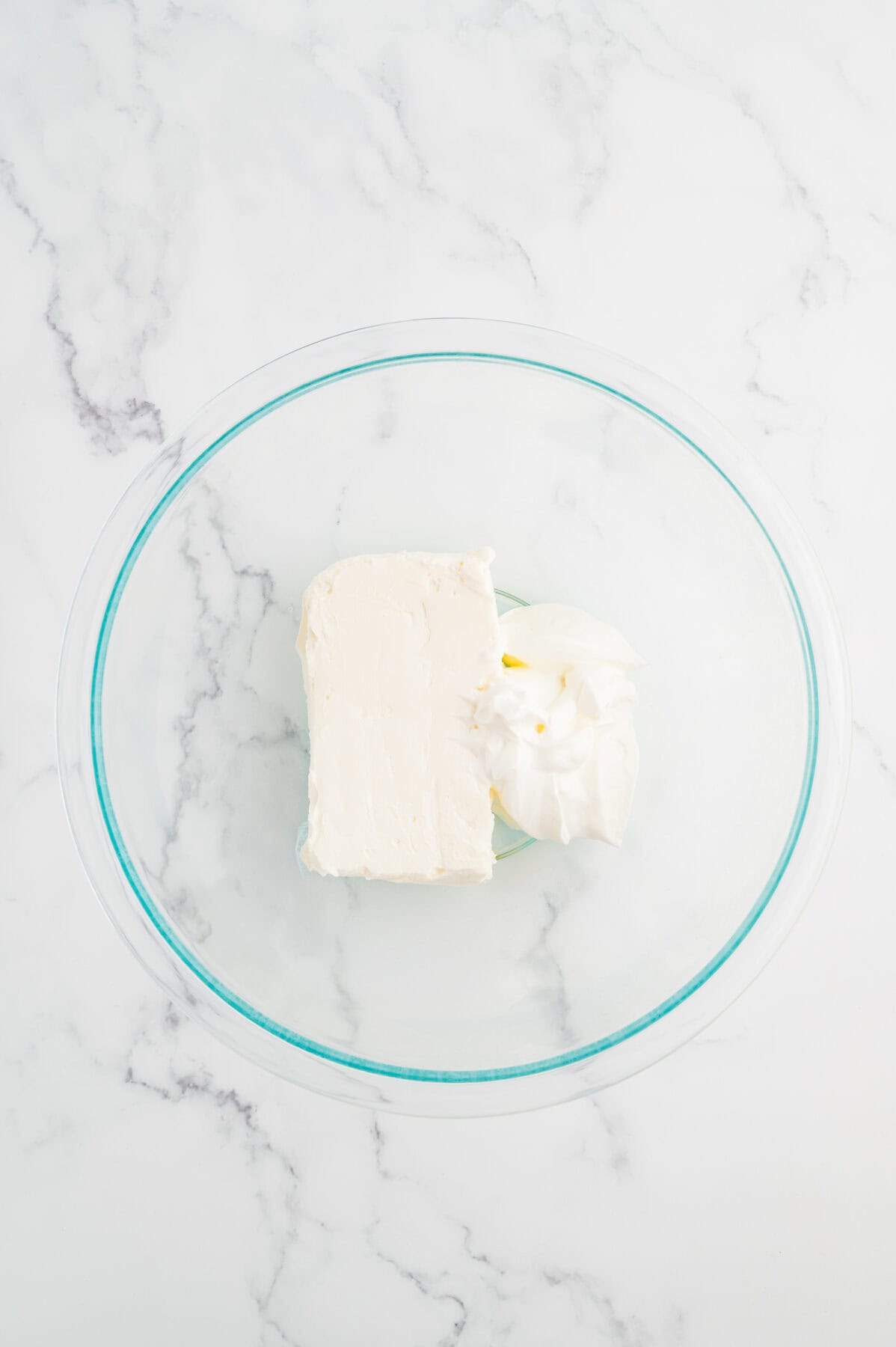 sour cream and cream cheese in a mixing bowl