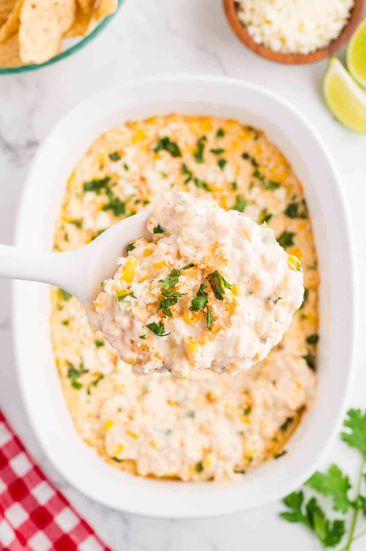 Mexican Street Corn Dip with a spoonful missing