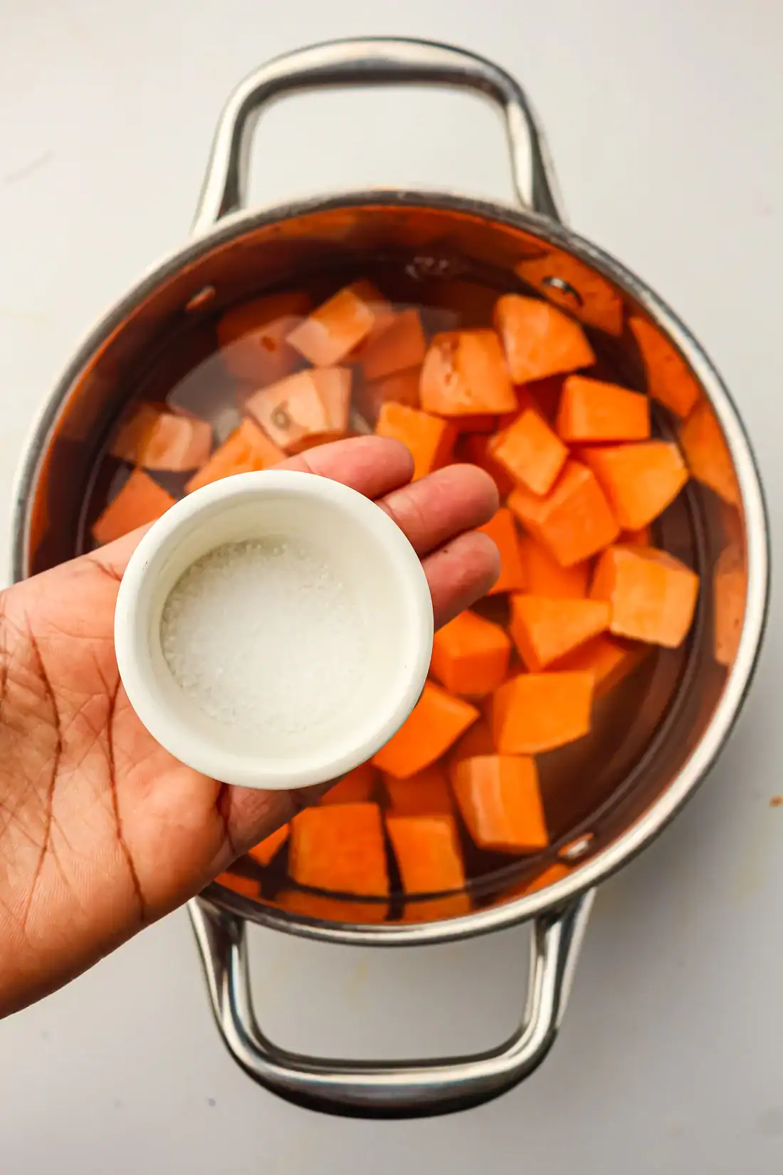 adding salt to sweet potatoes