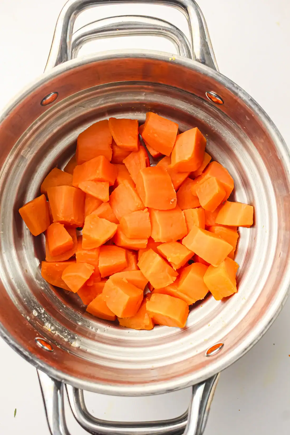 boiled sweet potatoes in a collander