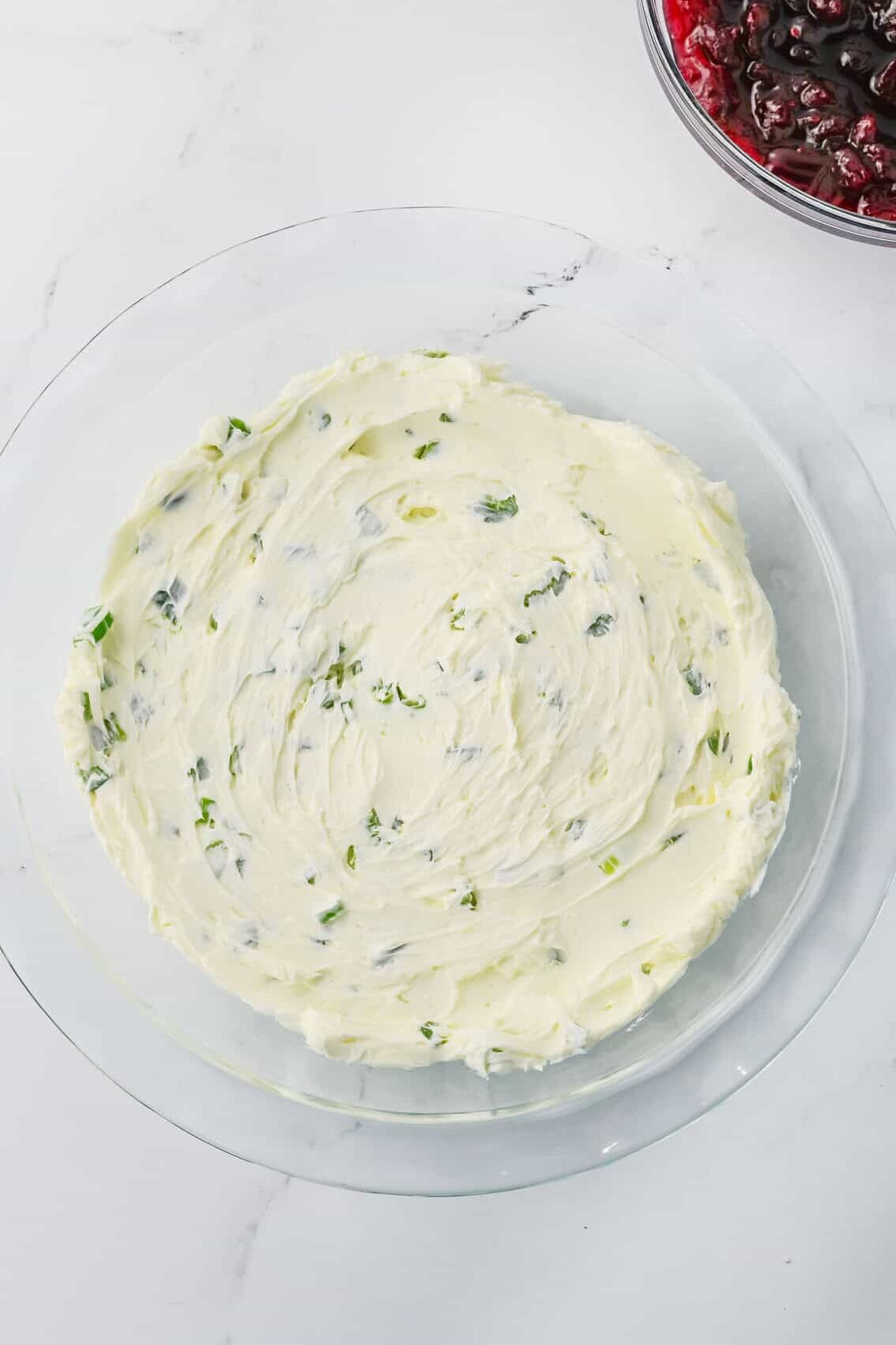 cream cheese mixture spread in a dish