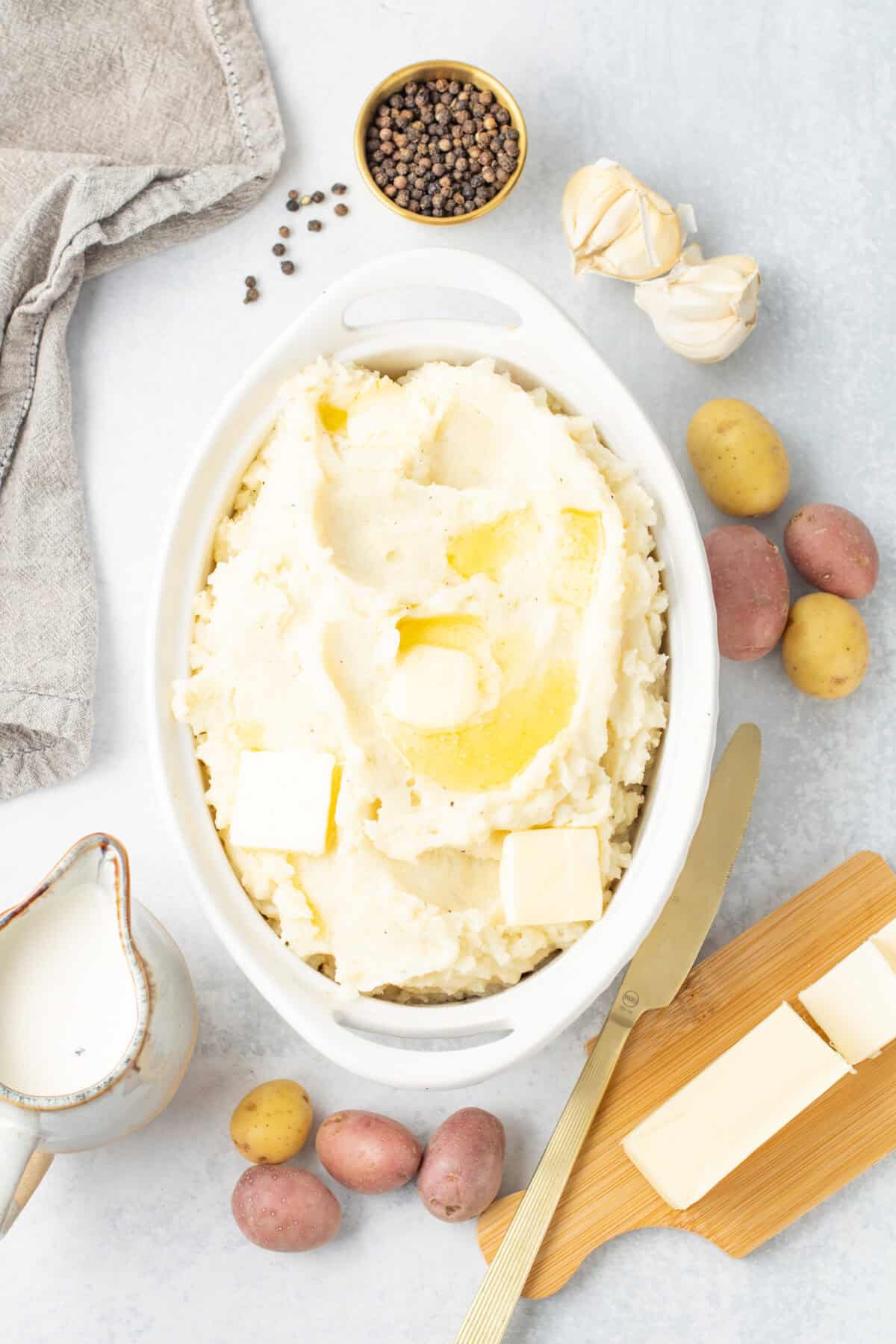 instant pot mashed potatoes transferred to a pretty dish