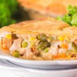 slice of turkey pot pie on a white plate