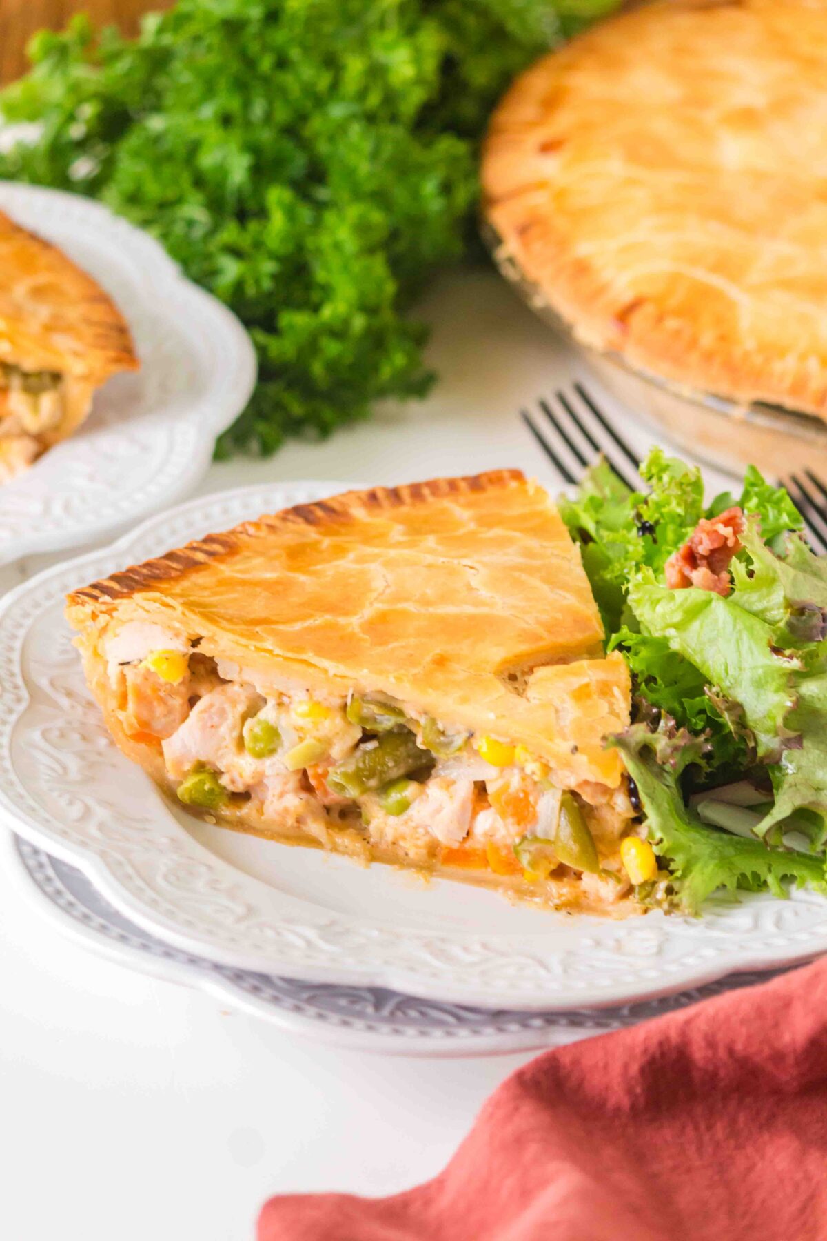 slice of turkey pot pie on a white plate