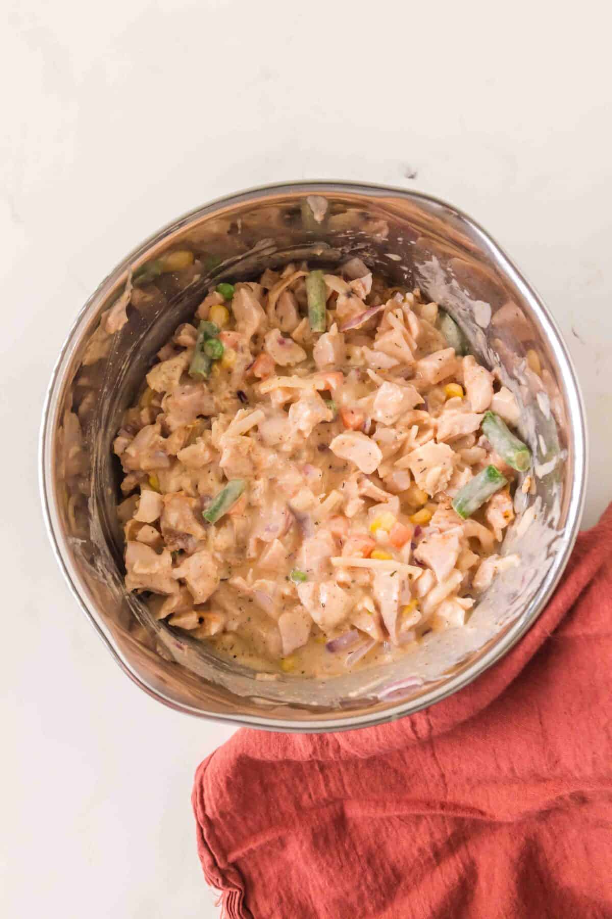 turkey stirred into the pot pie filling