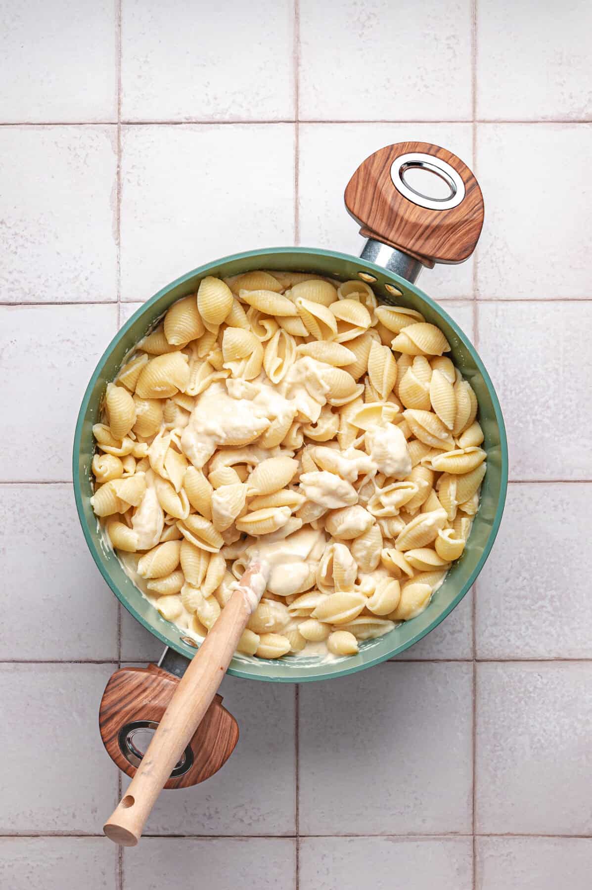 pasta stirred into white sauce